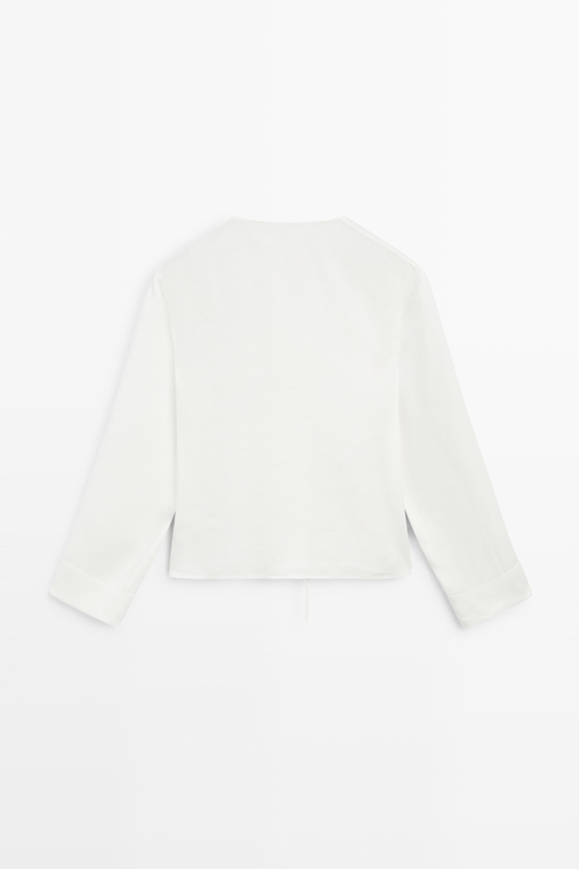 Flowing linen blend blouse with button detail